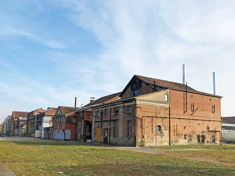 Auf dem Gelände der ehemaligen Gießerei von Mülhausen befinden sich viele Fabrikgebäude, die noch genutzt werden